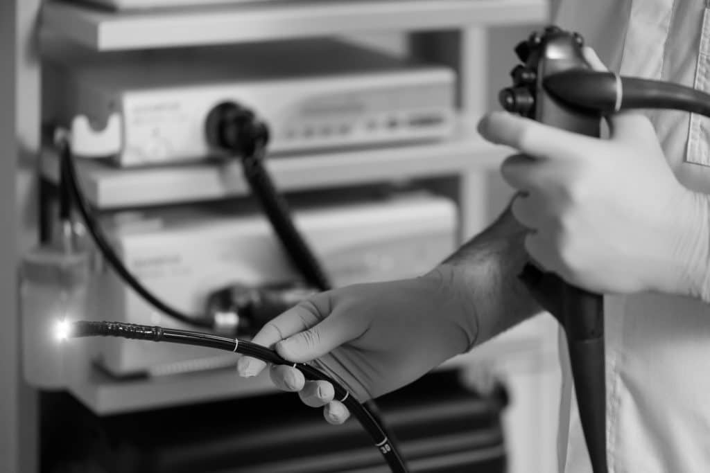 Doctor holding endoscope