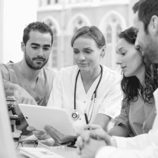 Doctors gathered around a computer